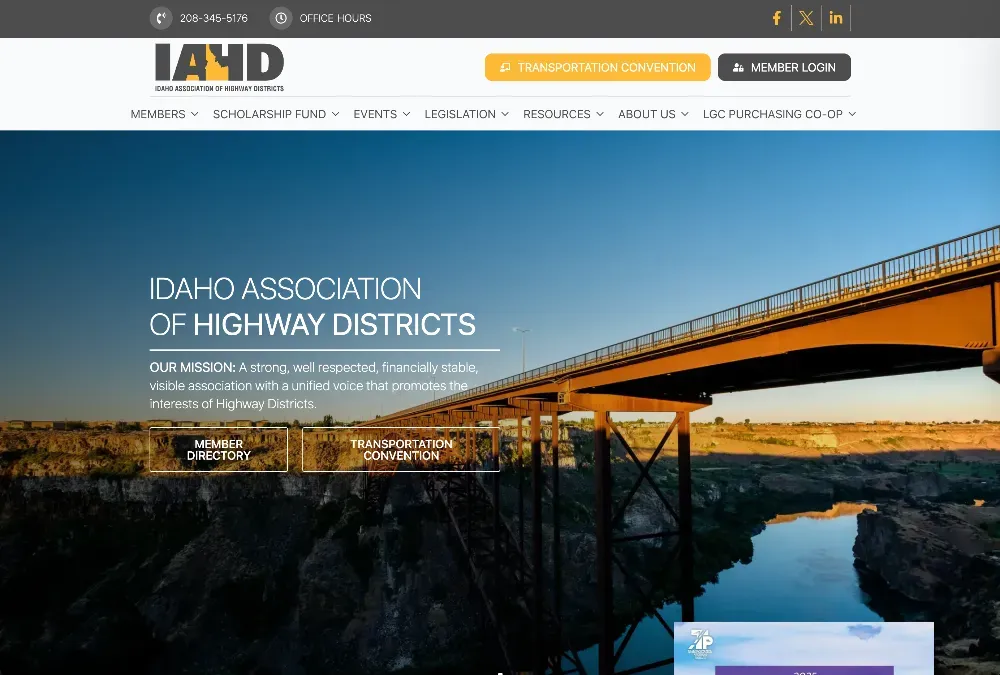 Website hero showing a steel truss bridge over a canyon at sunset, with the Idaho Association of Highway Districts mission